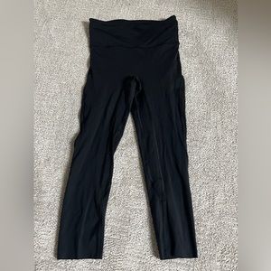 Lululemon black nulux crop leggings. Size 4. Back zipper pocket.